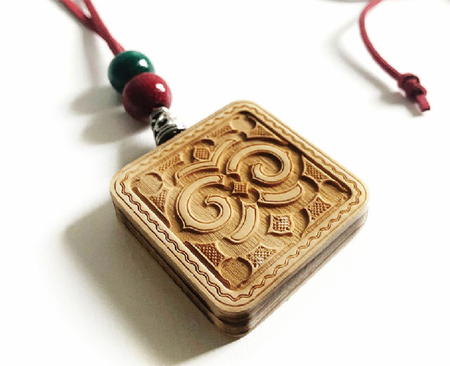 Pendant assembly experience with Ainu patterns